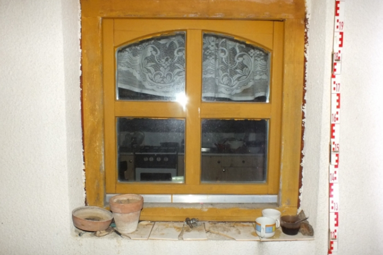 Egy liter pálinkáért tört be a nő